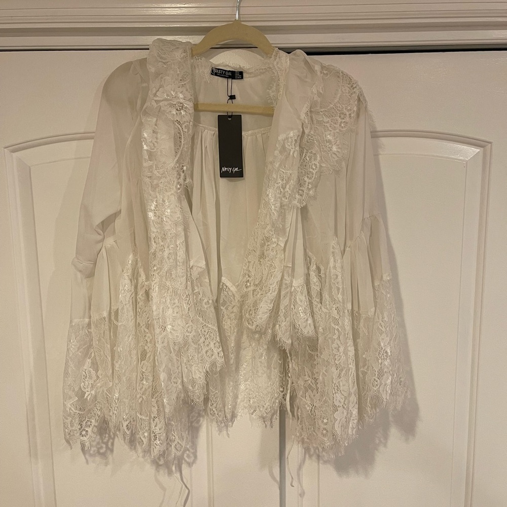 NASTY GAL hippie boho white lace cardigan with bell sleeves.